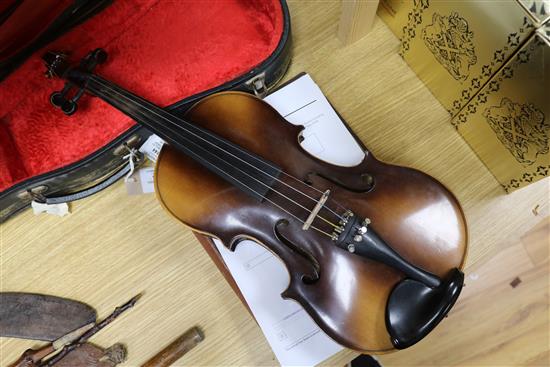 A Rosetti violin bearing faux Stradivarius label, cased with bow